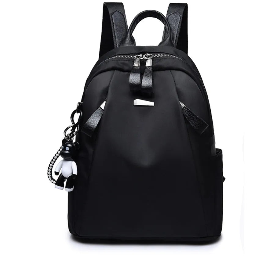 Medium square rucksack in Oxford cloth with internal organisation pockets.