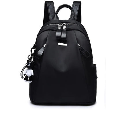 Medium square rucksack in Oxford cloth with internal organisation pockets.