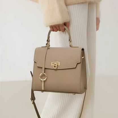 Elephant grey vintage handbag with lock detail and file organisation inside