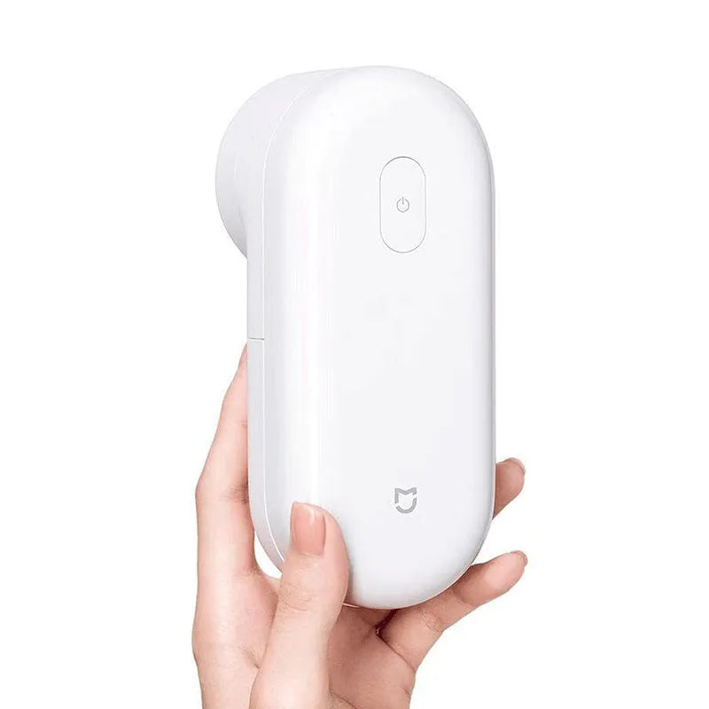 White rechargeable bulb remover tool with plastic case, 145x62x65mm, shown with cutter head options.