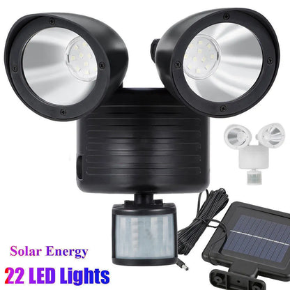Black and white double head solar security spotlight with motion sensor for outdoor installation
