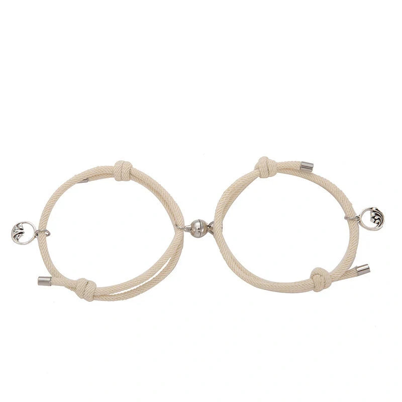 Magnetic couple's bracelet with geometric design and meaningful charms inspired by ancient Chinese tradition