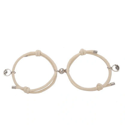 Magnetic couple's bracelet with geometric design and meaningful charms inspired by ancient Chinese tradition