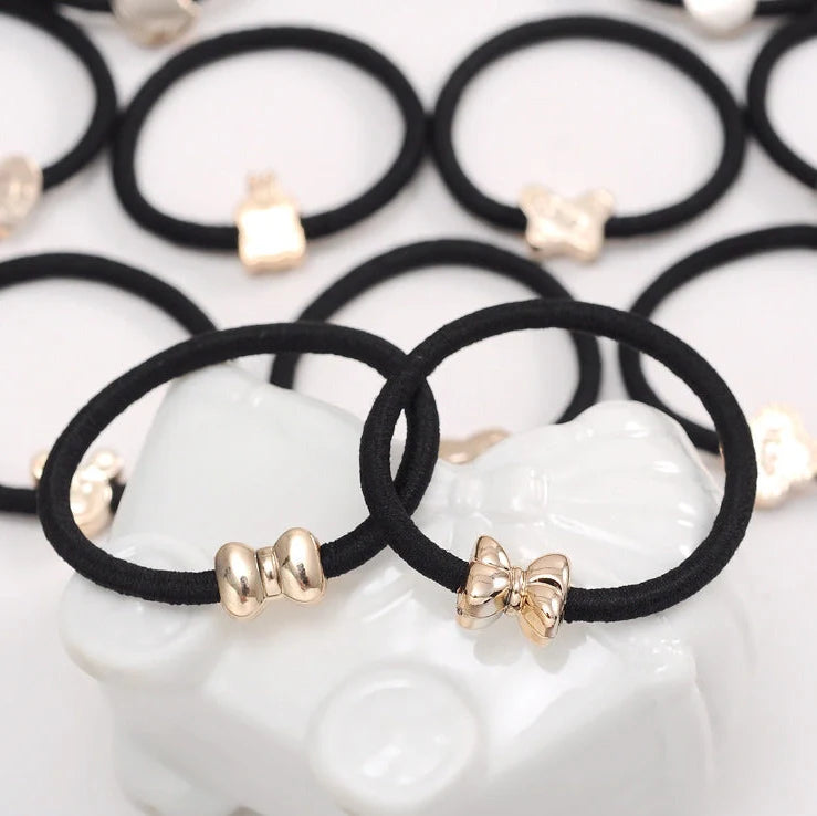 Korean rubber band hair accessories with gold bead plating, 50-piece pack with cartoon packaging