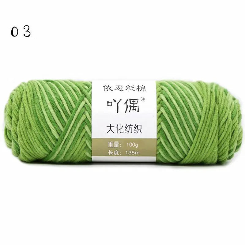 Eight strands of gradient milk cotton wool in a ball, showing multiple colour options for hand knitting.