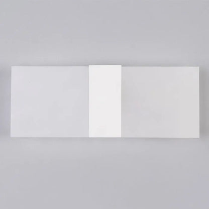 Modern rectangular acrylic LED wall lamp in a choice of black, gold or silver finishes.