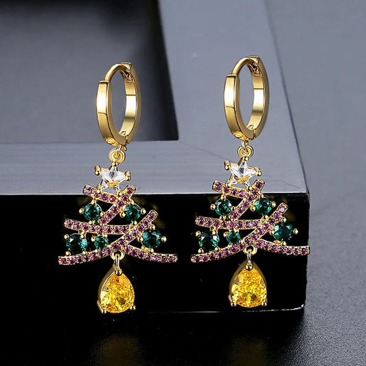 Shimmering gold Christmas tree earrings with colorful rhinestones, a must-have holiday fashion accessory