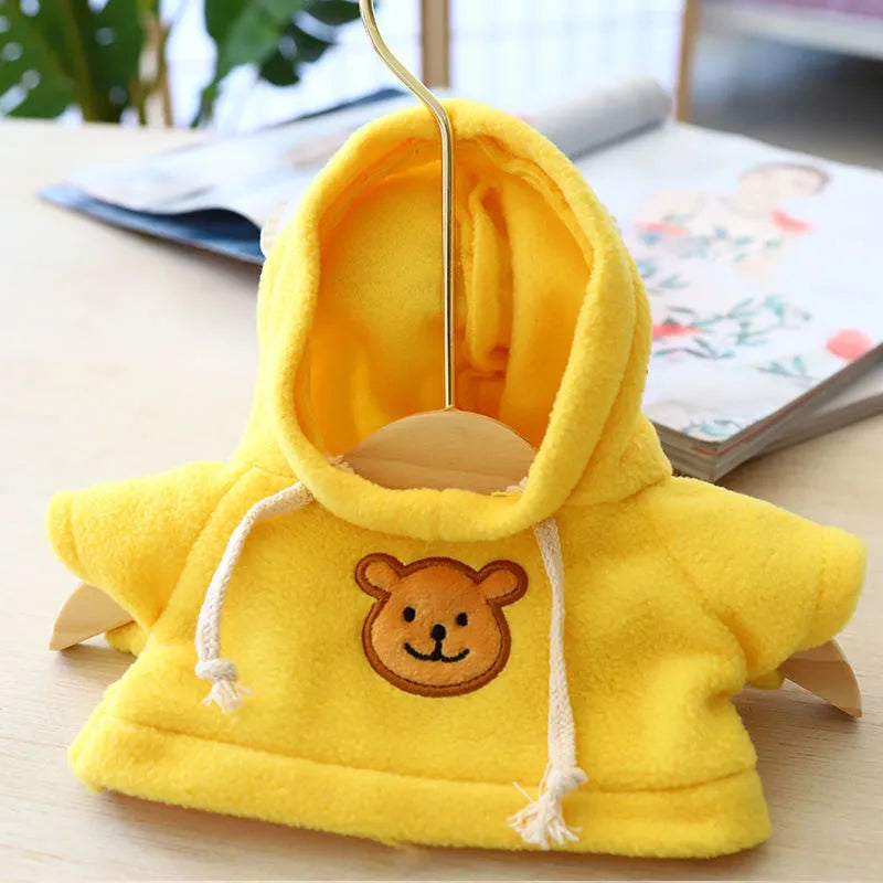 Cloth dog hoodie sweater in blue, shown in medium 23cm size on a small dog.