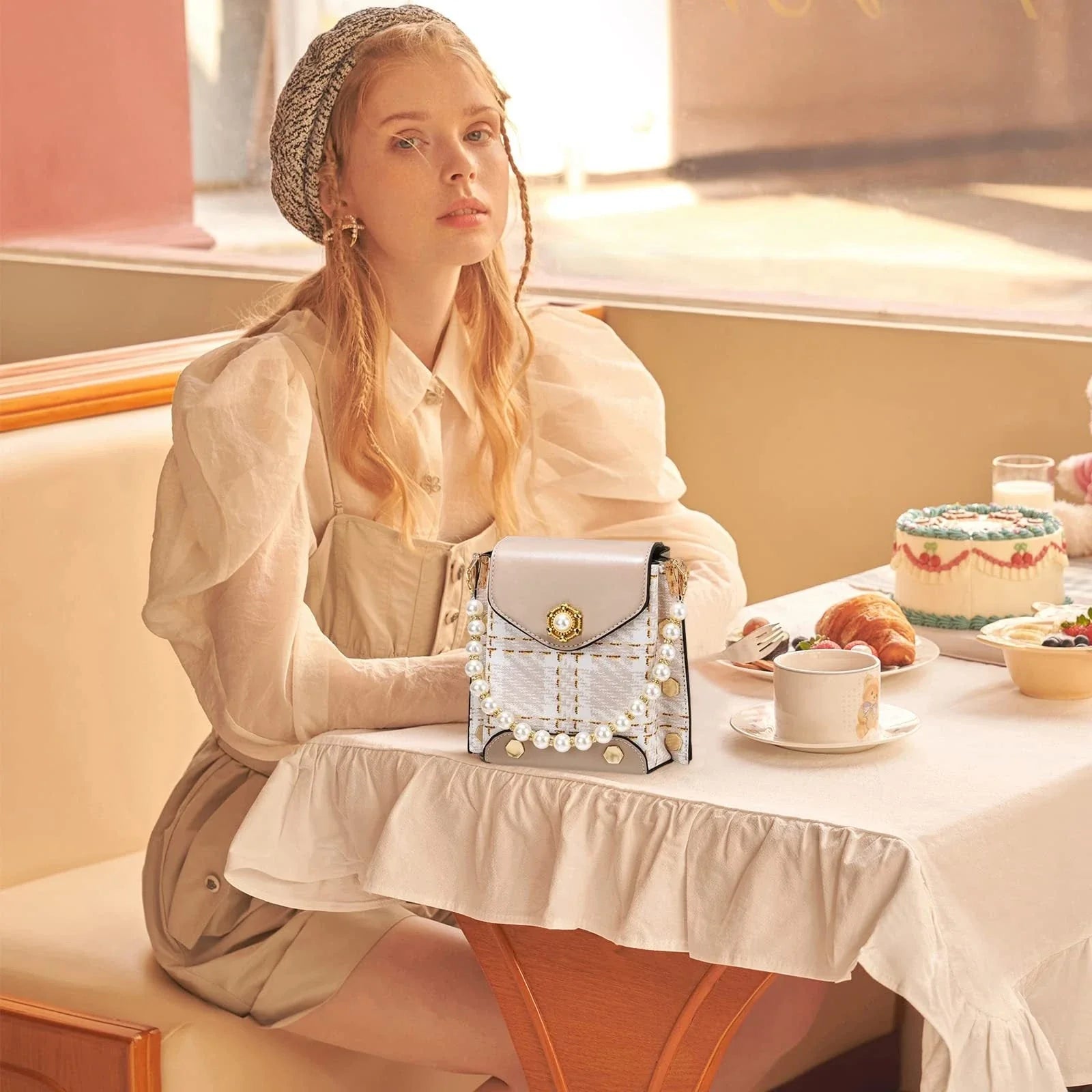 Stylish crossbody bag for women with delicate pearl pendant and adjustable strap for versatile carrying options