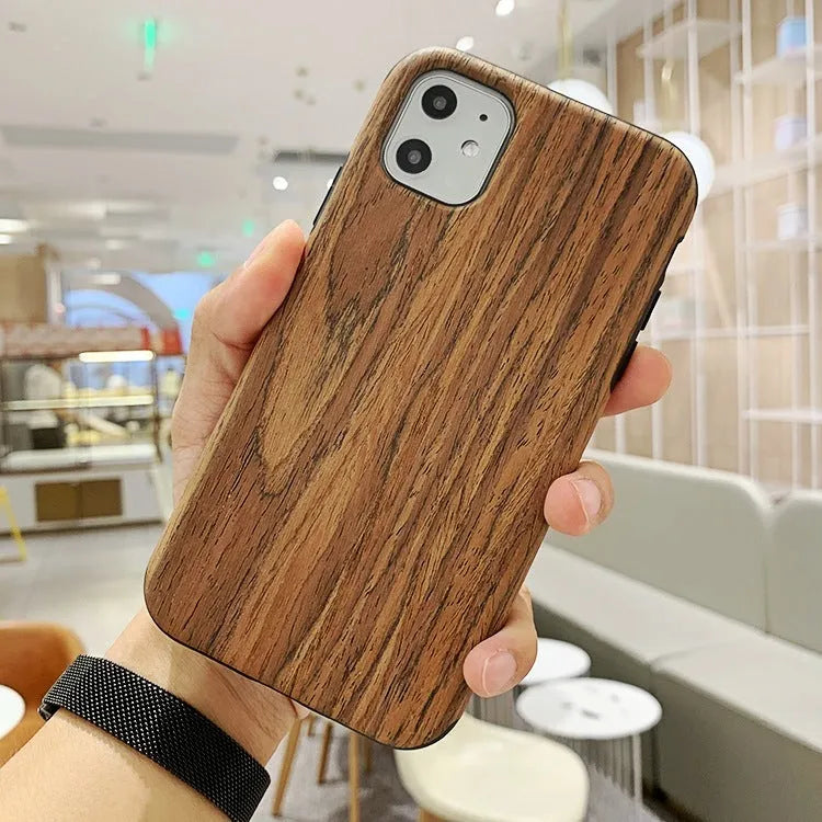 Slim natural wood iPhone case in teak, walnut, black rose, and rosewood colours.