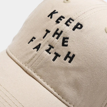 Men's cotton baseball cap with small embroidered letters on front in adjustable dome design