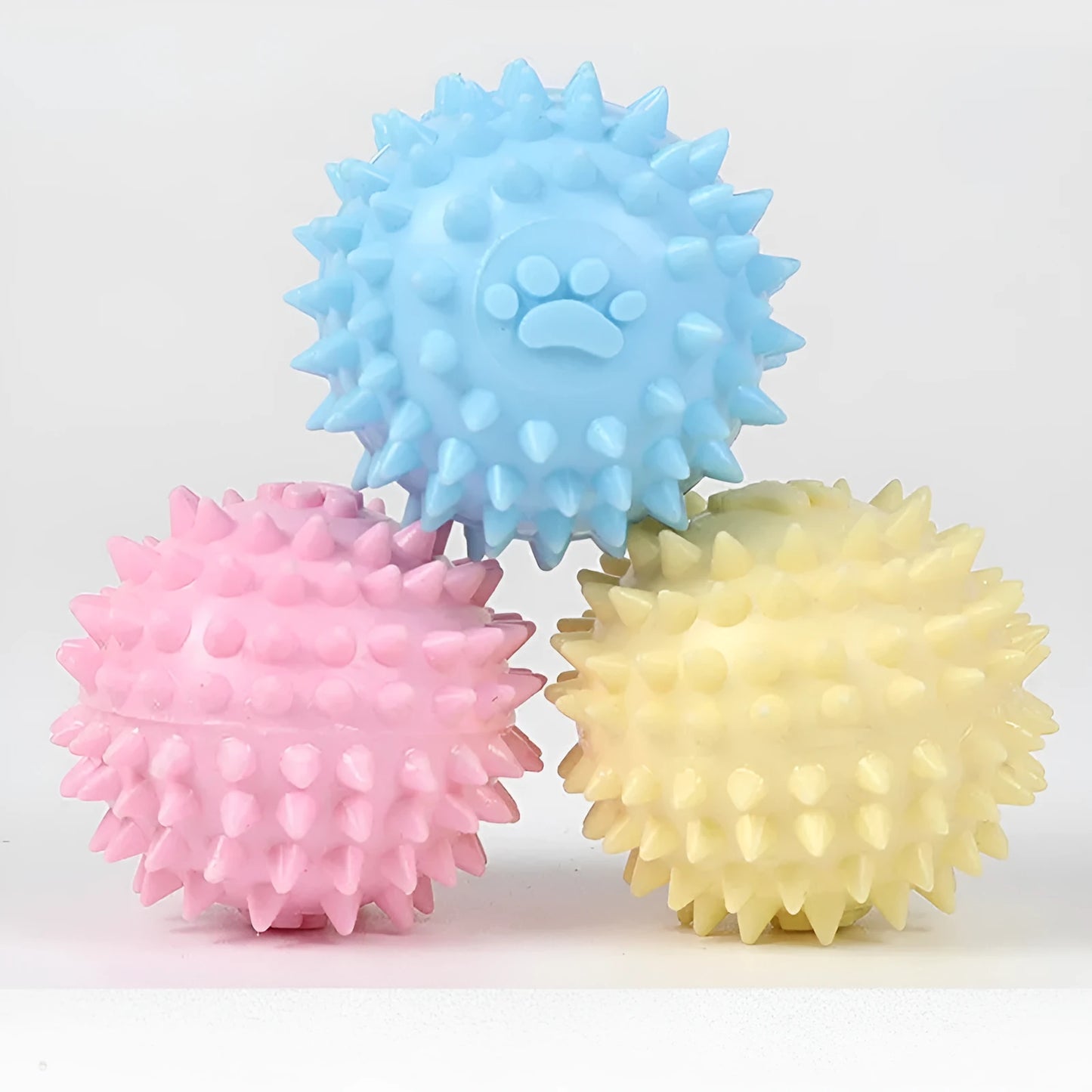 TPR dog chewing ball with footprint texture, 6cm diameter, in blue, pink or yellow