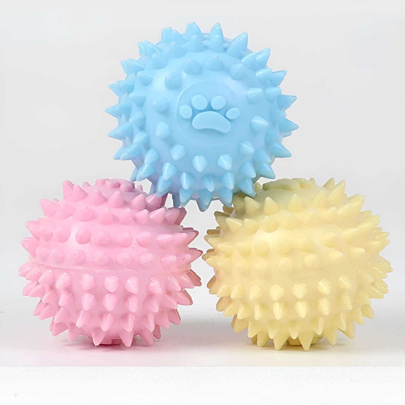 TPR dog chewing ball with footprint texture, 6cm diameter, in blue, pink or yellow