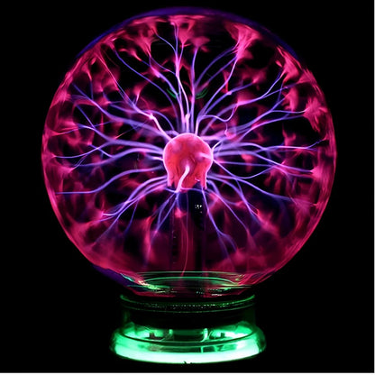 Plasma lightning ball with electrostatic induction showing colourful electrical discharges on glass surface