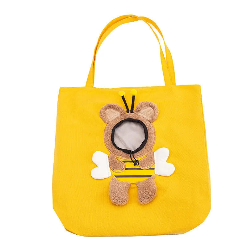 Little Bee Design blue canvas pet carrier bag with animal pattern, showing adjustable side opening for a pet's head.