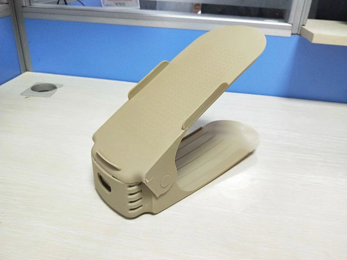 Adjustable dual-tier shoe organizer rack made of durable polypropylene material