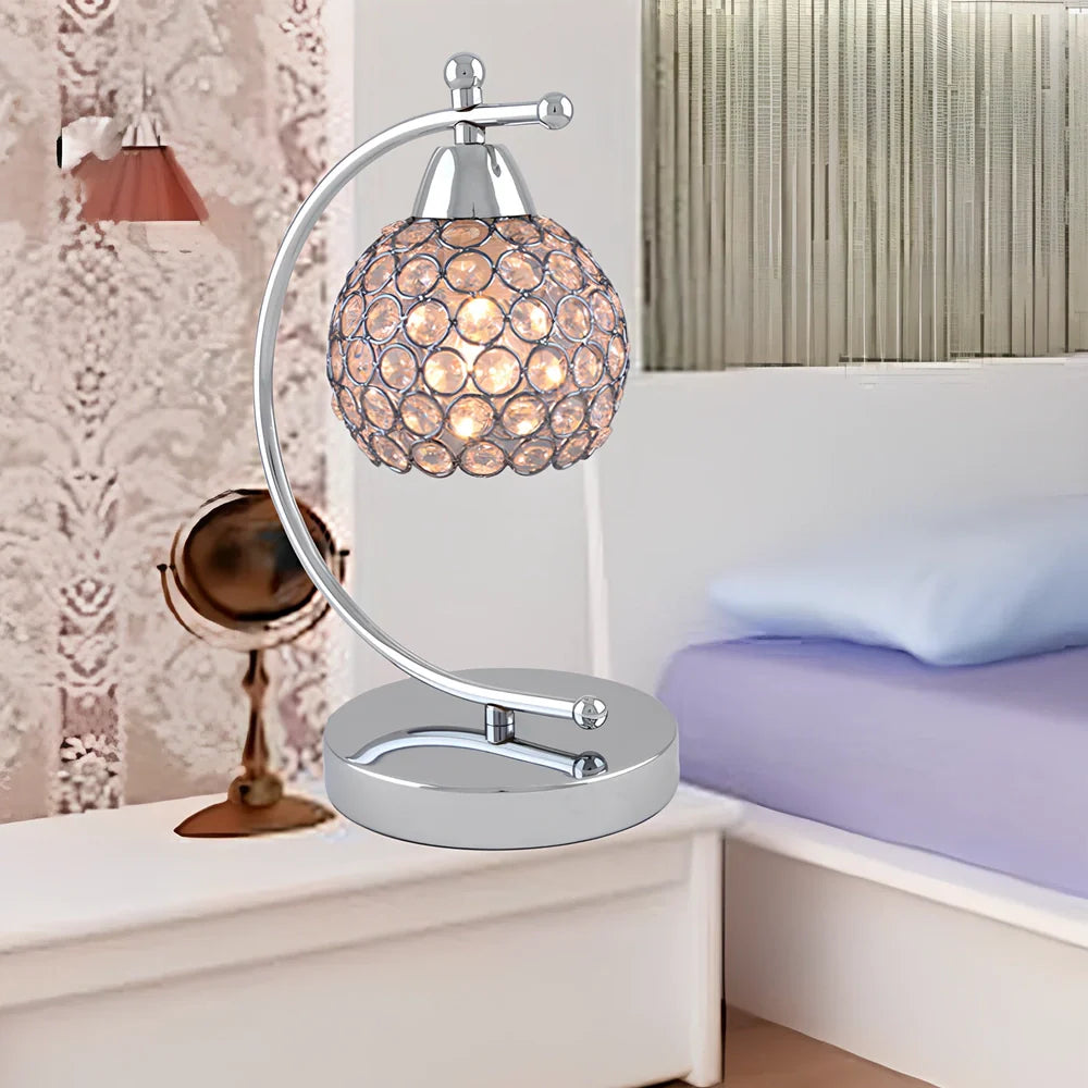 Crystal table lamp with chrome iron body measuring 31cm height