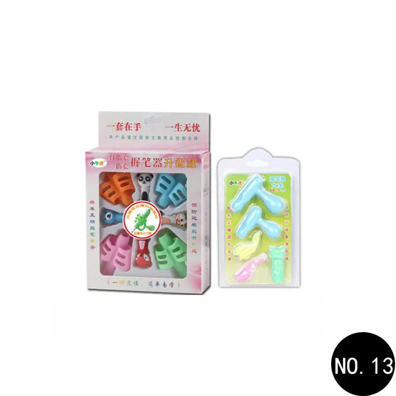 Cartoon children's stationery pen holder made from environmentally friendly soft rubber that corrects student writing posture and helps prevent myopia, supplied in a colour box with 13 different design style options