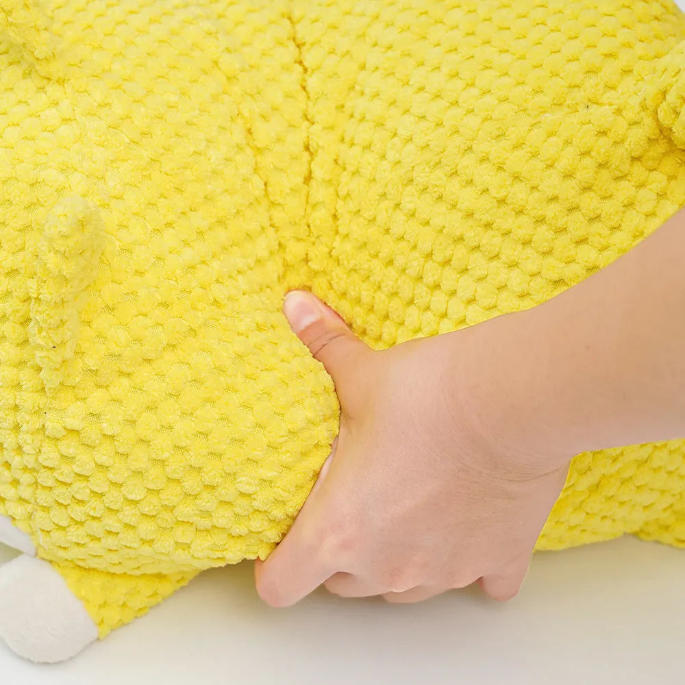 Bite-resistant plush dog toy in pillow shape with squeaker for calming and teething support