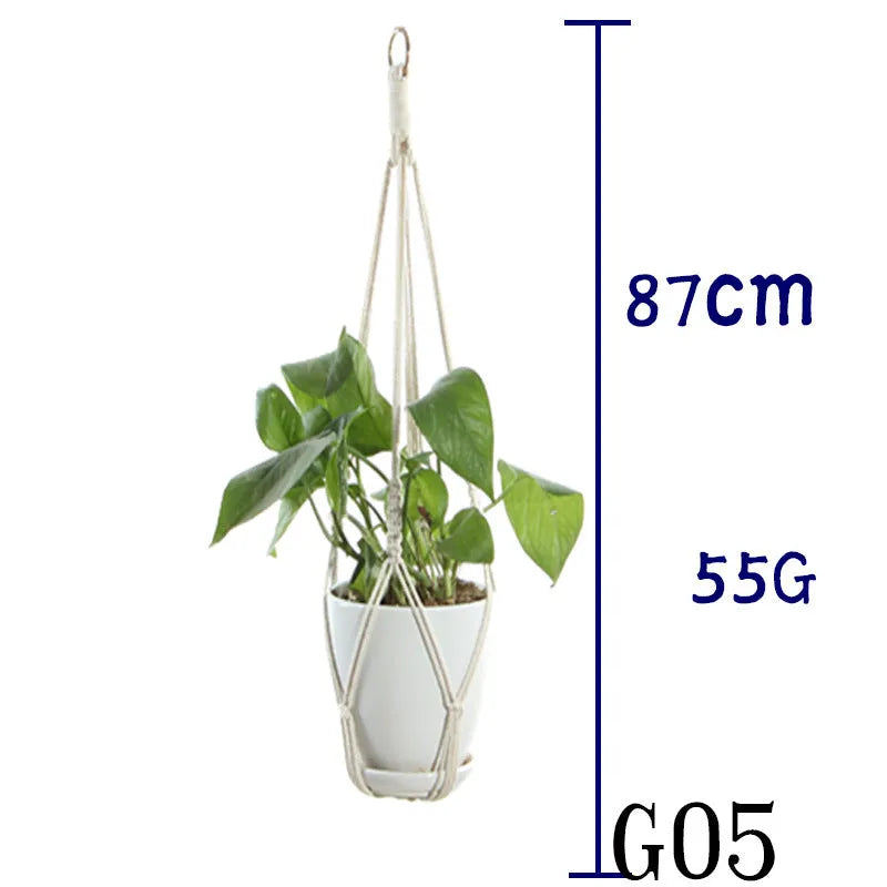 Handmade beige cotton rope net bag holding a plant pot, showing its textured sling design.