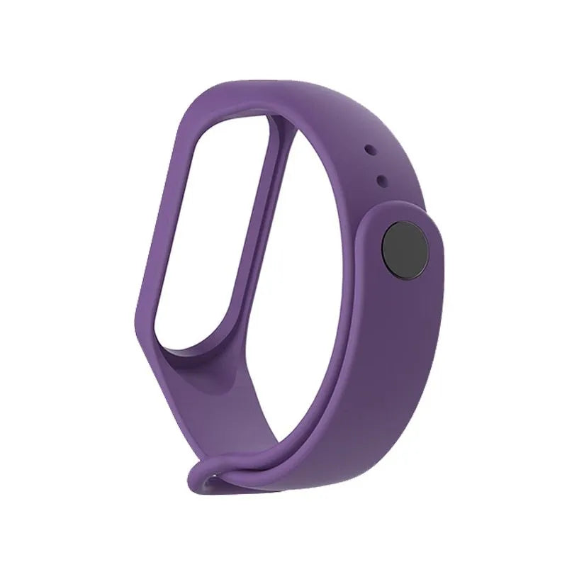 Colourful silicone replacement strap for XIAOMI MI Band 3 smart watch on a wrist.