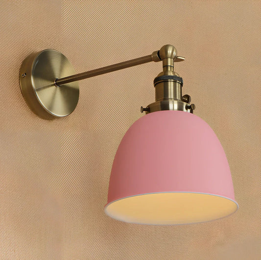 Bedroom wall light with 15cm wide iron shade in pink colour, mounted 20cm projection for soft illumination