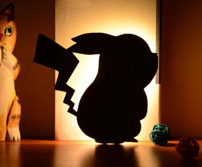 Charming pet-inspired mood lamp with various animal-shaped designs, including walking cat, mother and child cat, licking cat, and Pikachu