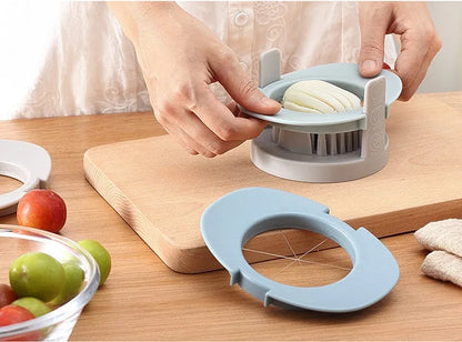 Three-function manual egg cutter in blue with stackable design for kitchen use