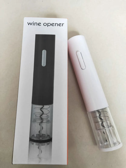 Black automatic electric wine opener with foil cutter showing battery compartment and cork removal mechanism
