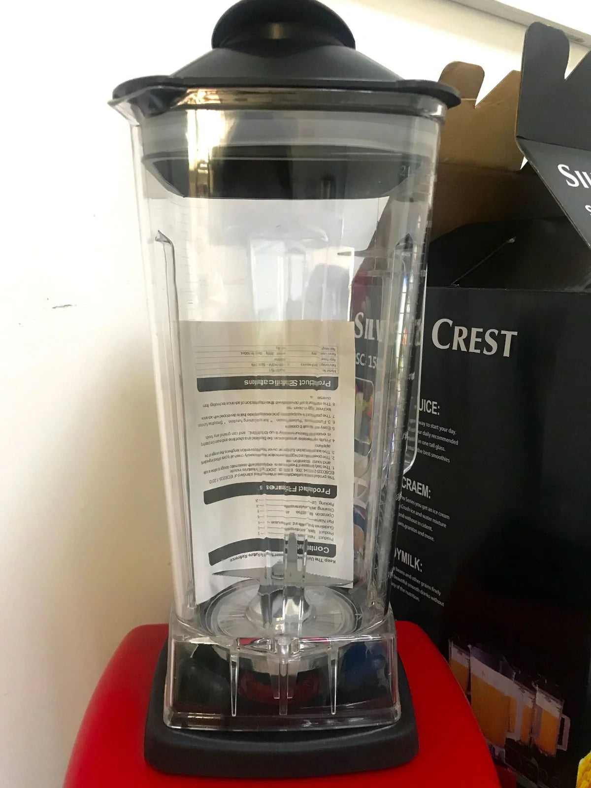 Red multifunctional juicer blender with 3000W motor, container, and base for kitchen food processing