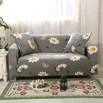 Printed stretchable sofa slipcover with geometric abstraction pattern on a three-seater sofa, showing tight fit and modern design.