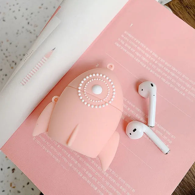 Pink silicone protective cover on an AirPods charging case.
