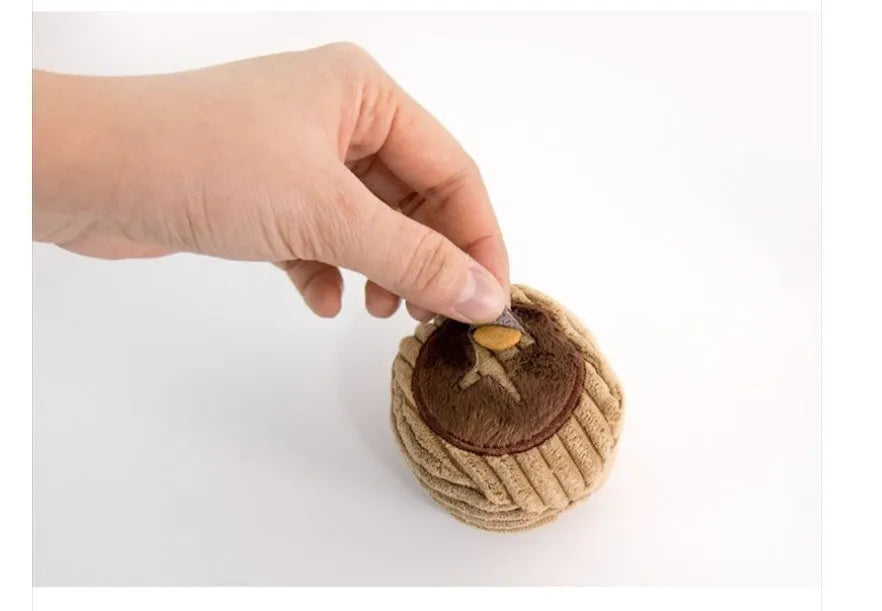 Dog sniffing toy set with two walnut pieces, one peanut piece and snack bag with rustling paper