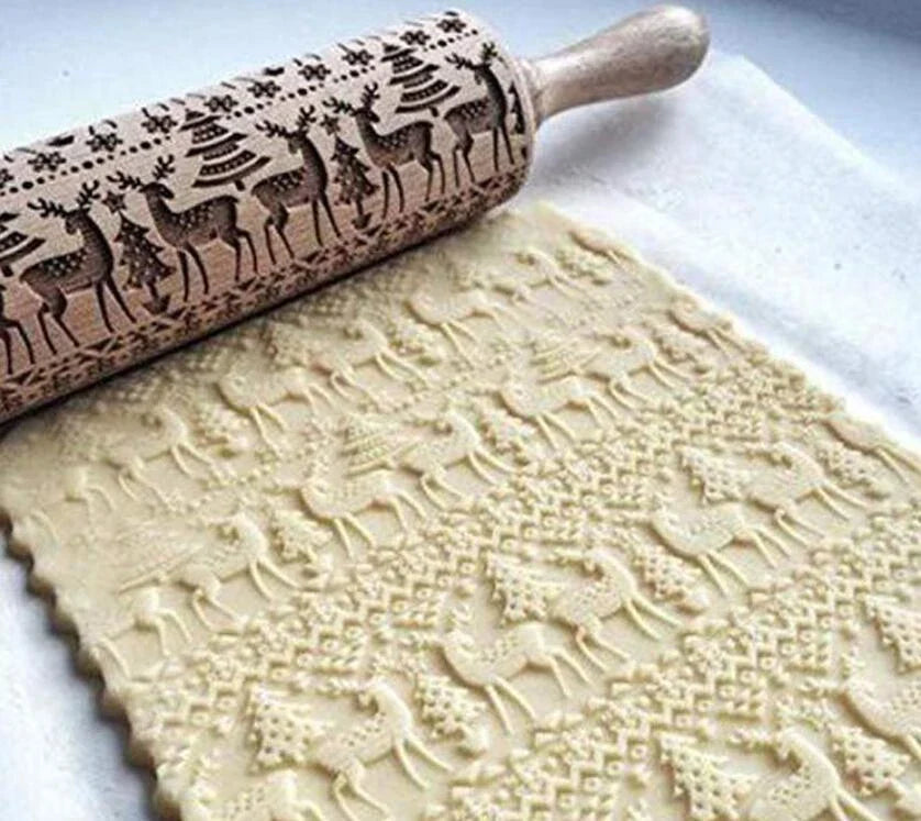 Festive rolling pin with embossed Christmas designs for easy imprinting on dough
