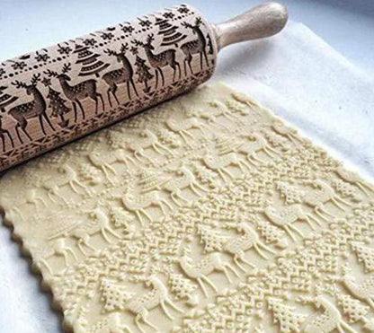 Festive rolling pin with embossed Christmas designs for easy imprinting on dough