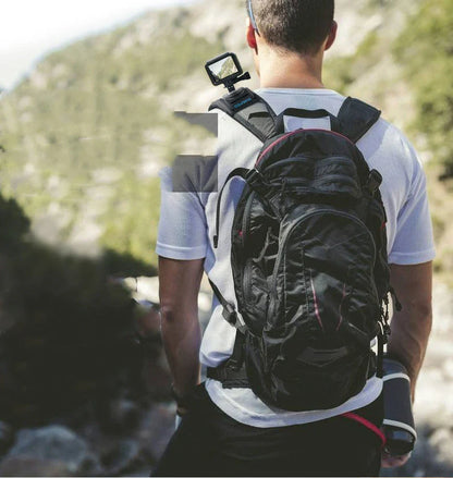 Camera backpack clip holder in black, made from POM/PVC plastic and polyester cloth