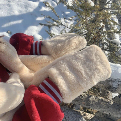 A cosy winter accessories set including a hat, scarf and gloves in grey, white and khaki colours