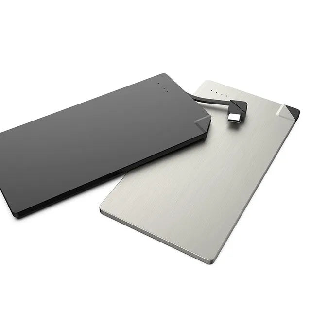 Silver graphene power bank showing ultra-slim 4mm profile with 4000mAh capacity for mobile charging