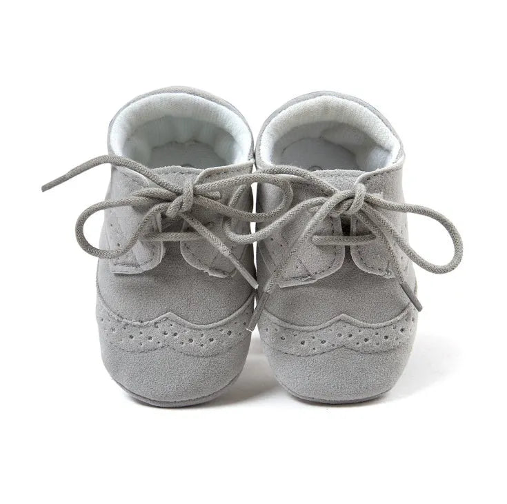 Men's vintage soft-soled baby shoes in synthetic leather, shown in light brown colour