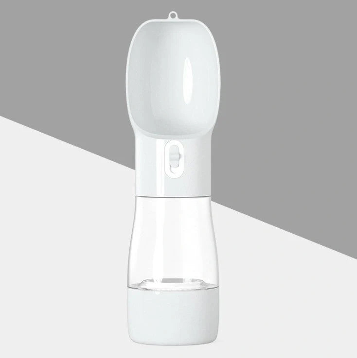 Traveling Out Portable Dog Water and Food Dispenser in pink, green, blue, and gray