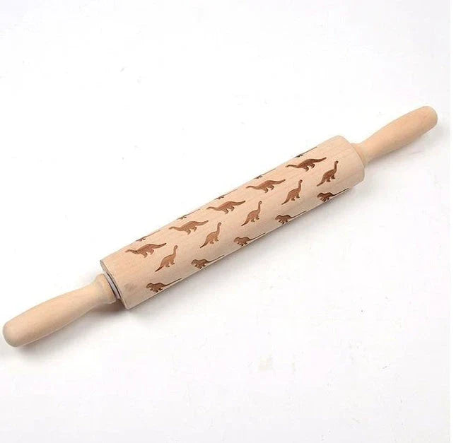 Festive rolling pin with embossed Christmas designs for easy imprinting on dough