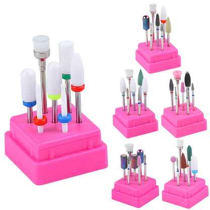 Set of six tungsten steel nail drill bits and a brush in a clear plastic case.