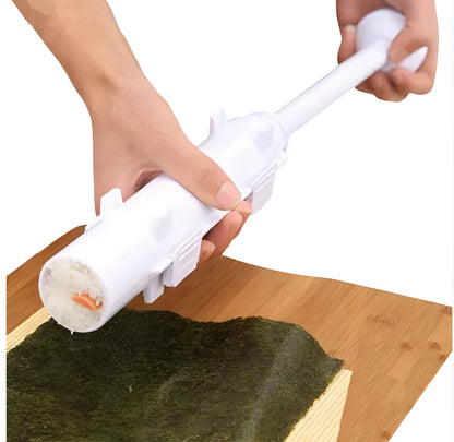White plastic sushi roll mould kitchen tool on a kitchen counter.