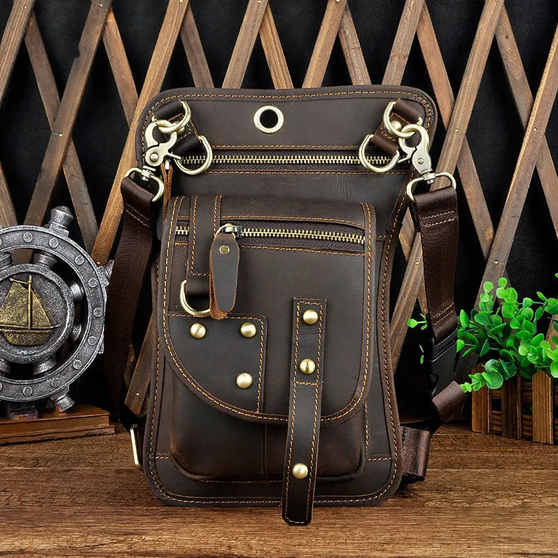 Men's black genuine cowhide leather fanny pack with zipper open showing internal phone and ID compartments