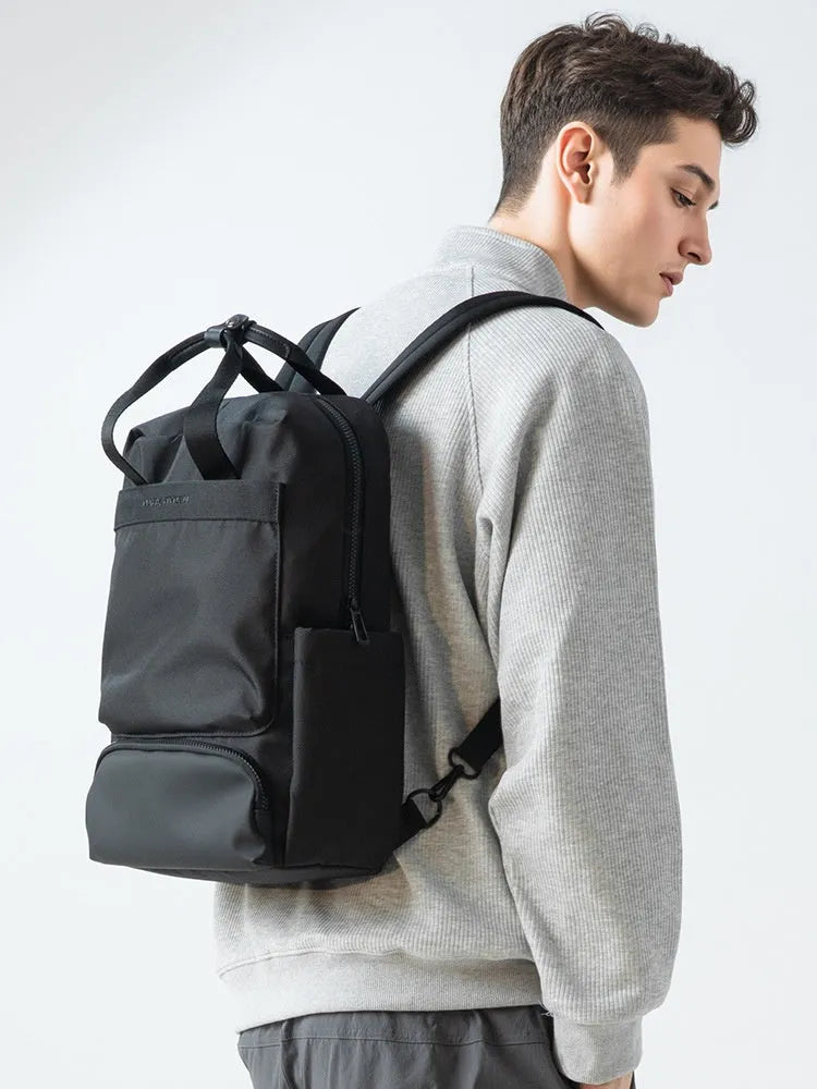 Black Oxford cloth computer backpack with 20-35 litre capacity for laptop storage