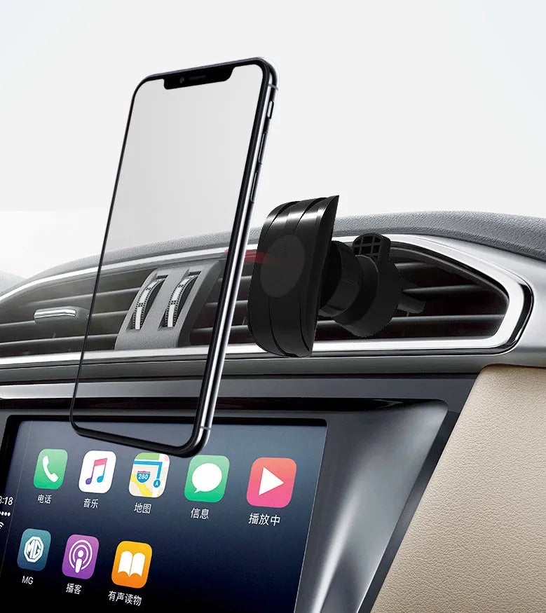 Matte black car phone holder clipped onto a car air vent