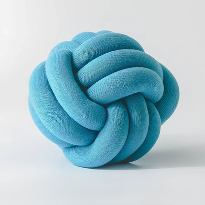 Knotted lumbar pillow with memory foam fill showing adjustable height feature and polyester cover