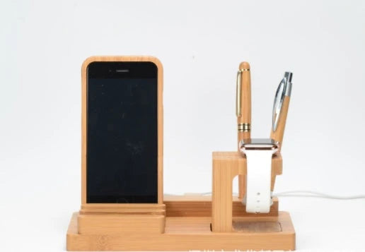 Bamboo charging station with multiple USB ports for charging Apple devices like iPhone, Apple Watch, and iPad
