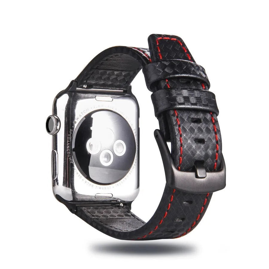 Leather Apple Watch strap with carbon fibre pattern case in red, black, orange, and blue colour options.