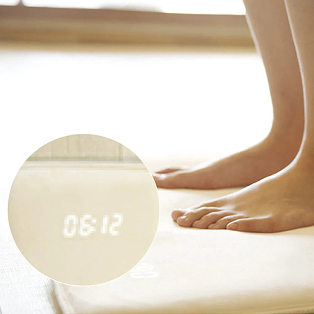 Smart pressure-sensitive alarm clock with LED display and memory foam base for comfortable, refreshing mornings